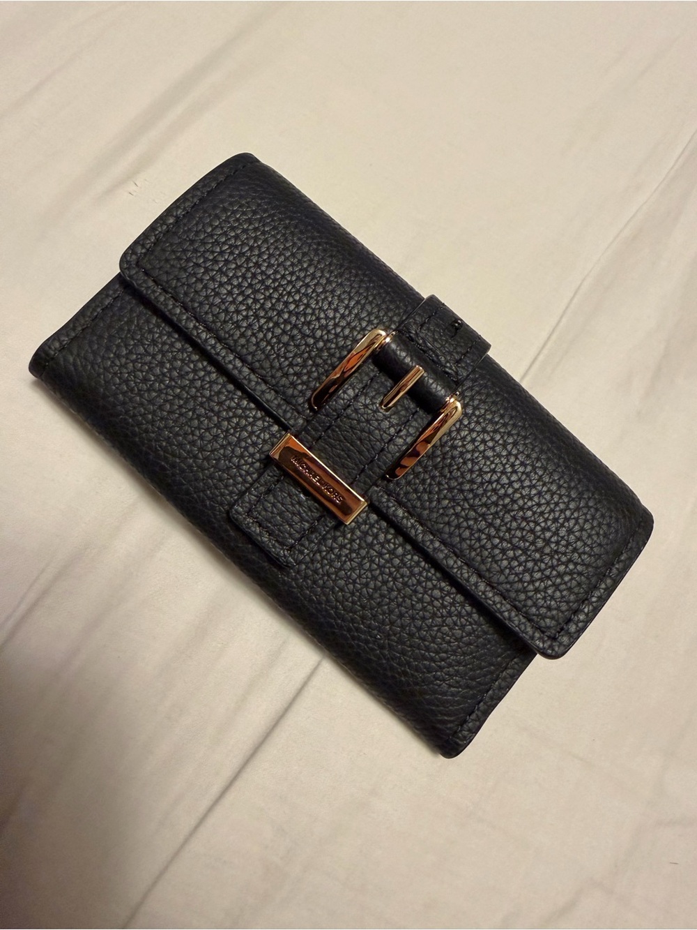 MICHAEL Michael Kors Black Pebbled Leather Fold-Over Wallet with Gold Buckle